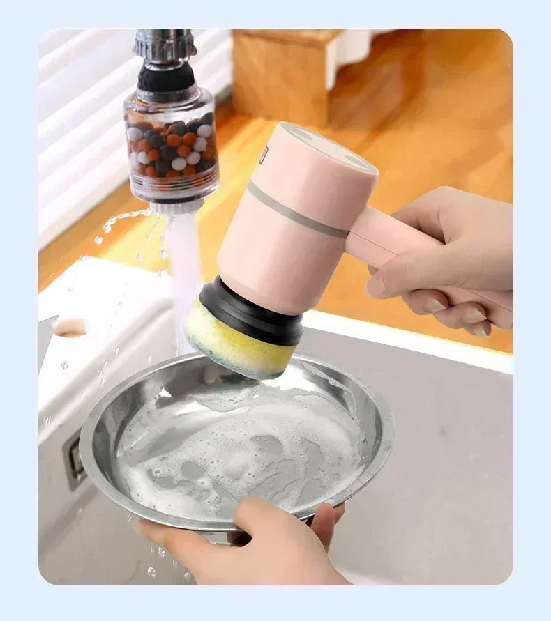 Electric scrubber cleaning soapy metal bowl under running kitchen tap water